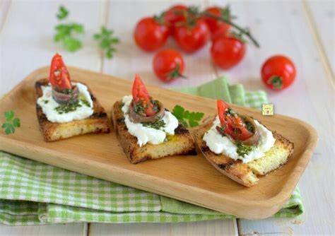 Bruschette con Salsiccia e Burrata