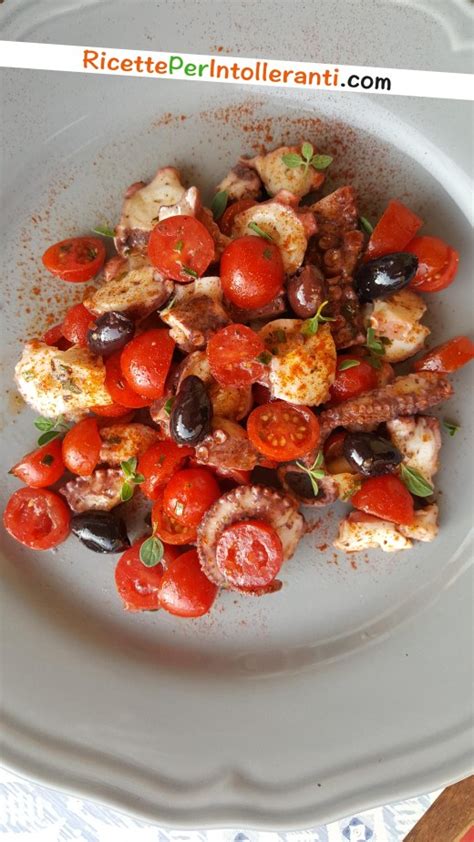 Carpaccio di Polpo con Pomodorini e Olive Nere