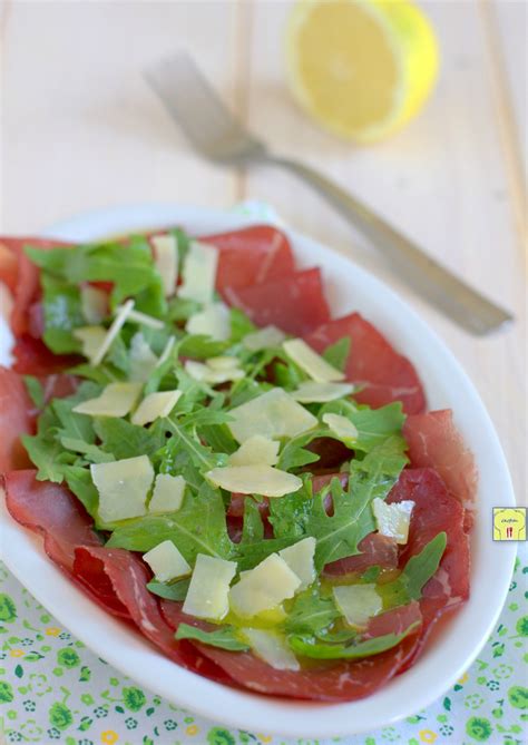 Carpaccio di bresaola con carciofi, soncino ed emulsione al limone