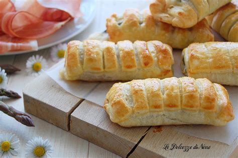 Fagottini di pasta sfoglia con speck e brie