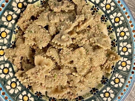 Farfalle con salsiccia e pesto di rucola