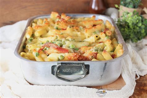 Pennette con piselli al pomodoro gratinate al forno