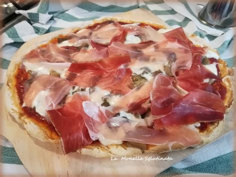 Pizza con funghi e speck