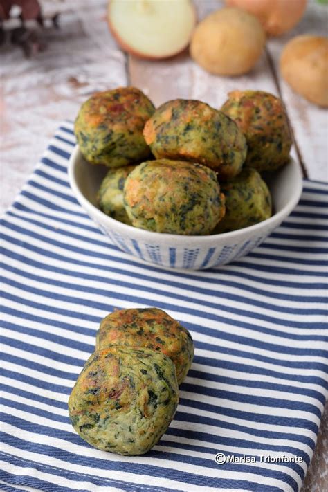 Polpette di patate, salsiccia e spinaci al forno
