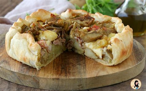 Preparazione della Pasta Sfoglia con Carciofi e Formaggio