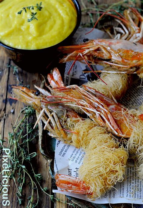 Salsa al mango servita con gamberoni