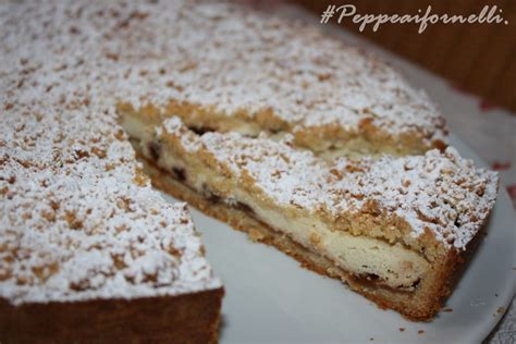 Sbrisolona con ricotta e marmellata di arance