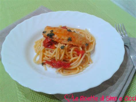 Spaghetti con nasello e pomodorini